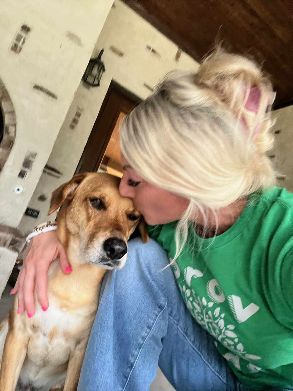 Kristan Herin, owner of Good Shepherd Boarding, with one of the dogs